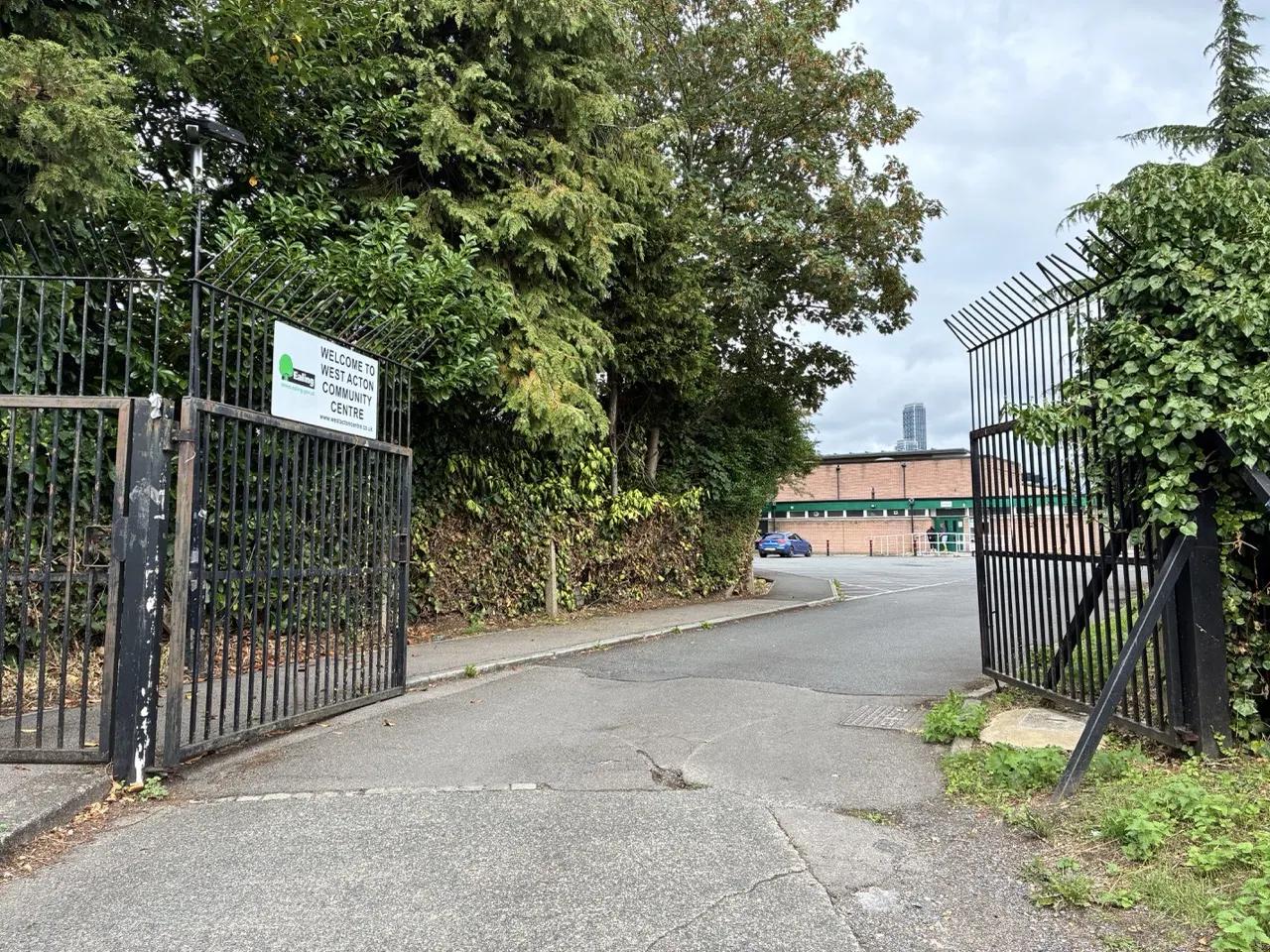 Entrance gates and sign of West Acton Community Centre